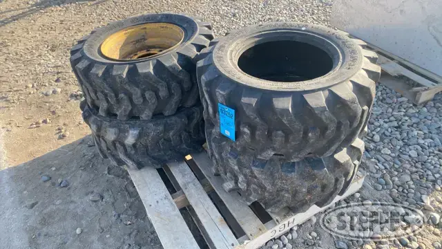 (4) 12-16.5NHS skid steer tires
