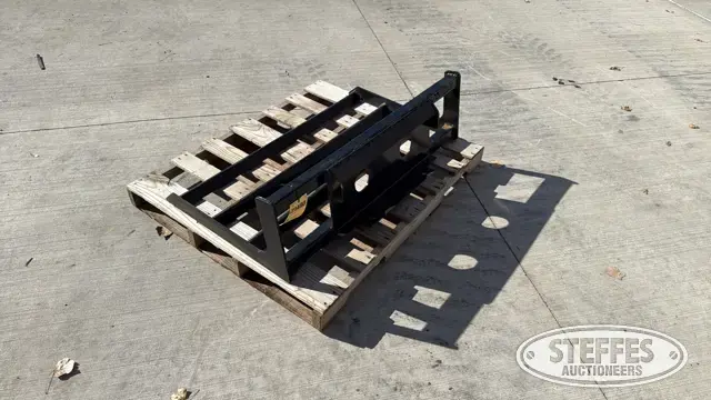 Mini skid steer land leveler