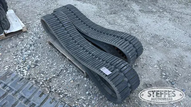 (2) Skid steer tracks