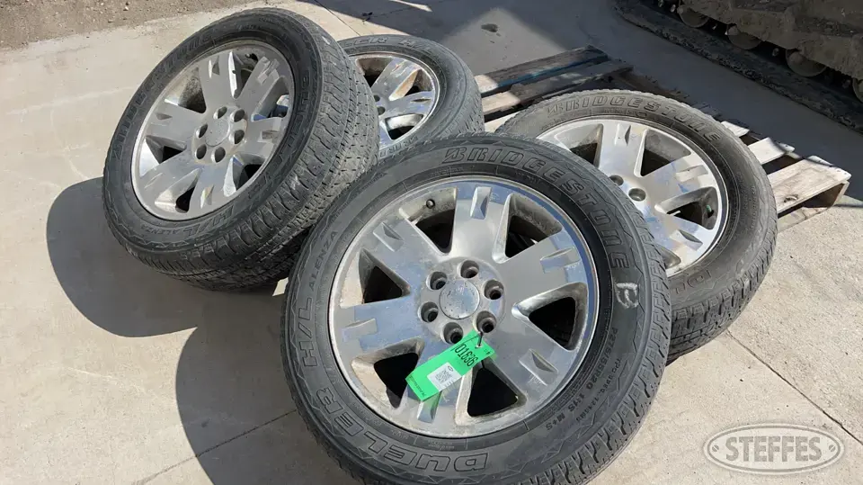 (4) Bridgestone P275/55R20 tires Passenger-Light Truck Tire
