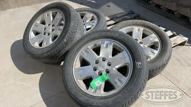 (4) Bridgestone P275/55R20 tires
