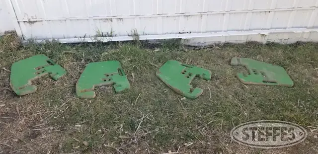 (4) John Deere Suitcase Weights