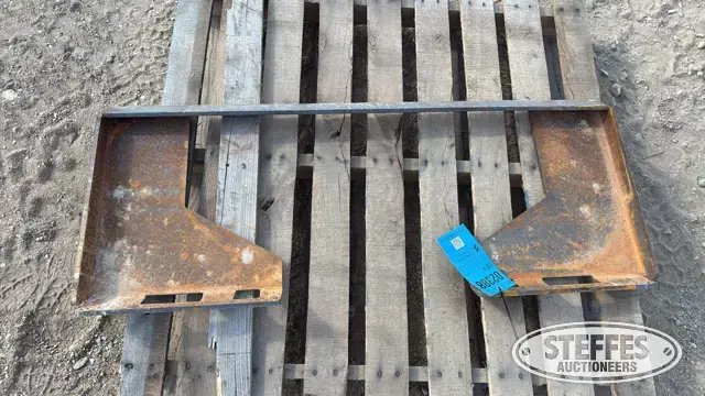 Skid steer plate
