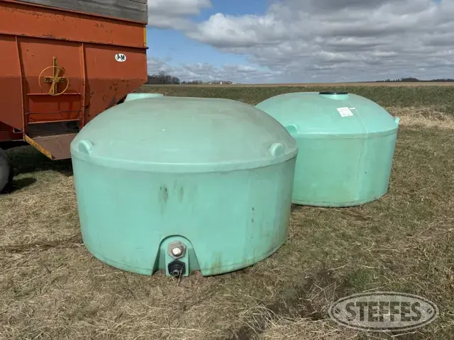 (2) 1,050 gal. poly tanks