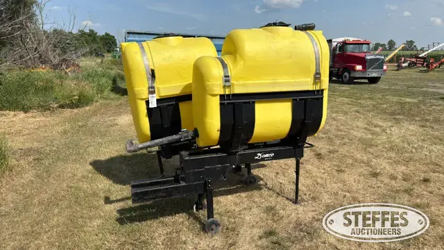 (2) Demco 200 gal. poly saddle tanks