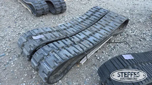 (2) Skid steer tracks