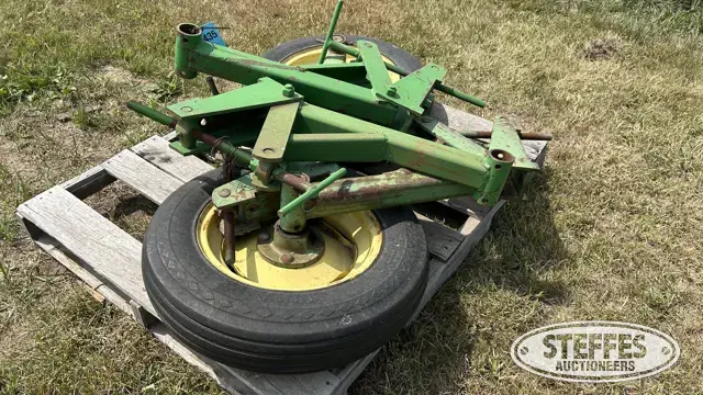 (2) John Deere gauge wheel assemblies