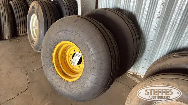 (2) implement tires on rims