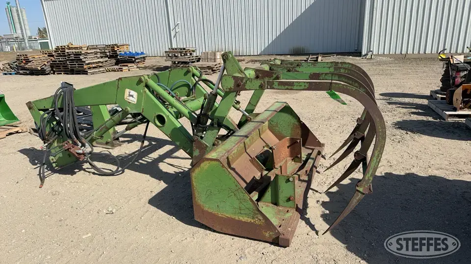 John Deere 148 Tractor Loaders and Attachment