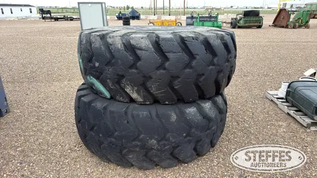 (2) Firestone 29.5-29 tires