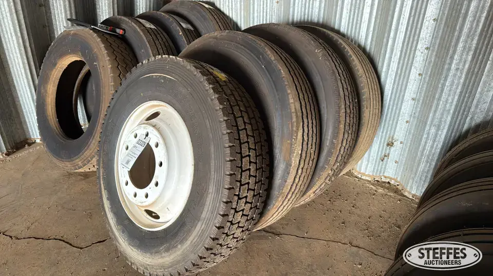 (4) Truck tires on wheels
