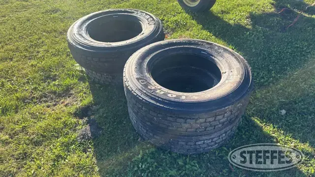 (4) Firestone 295/75R22.5 tires