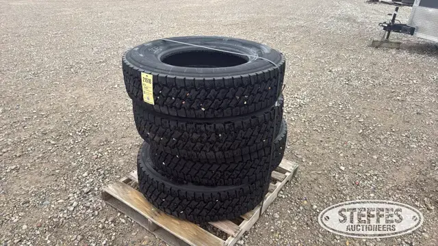 (4) Bridgestone 295/75R22.5 tires