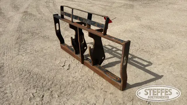 Wheeled loader fork carriage