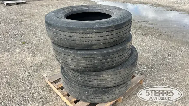 (4) Firestone 295/75R22.5 tires