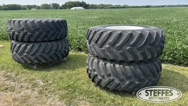 (4) Titan 24.5x32 tires