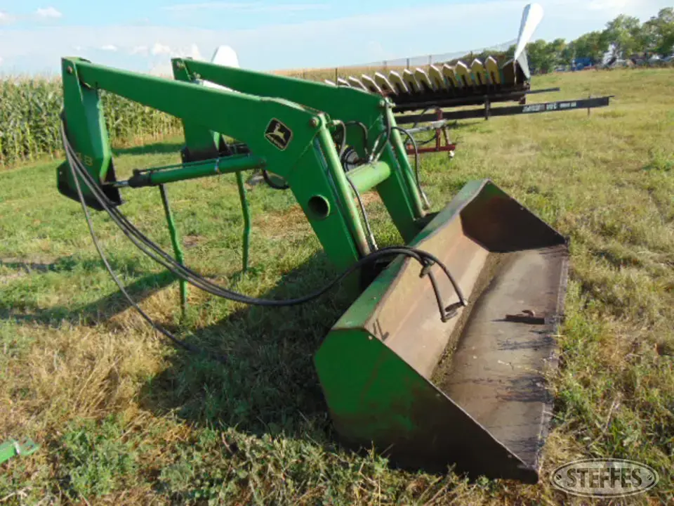John Deere 148 Tractor Loaders and Attachment