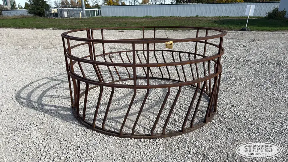 (2) Round bale feeders Feeders and Bunk