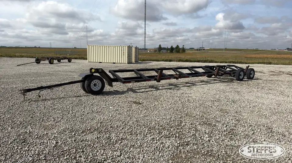 Tandem axle header trailer