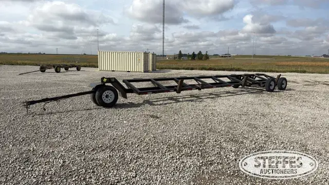 Tandem axle header trailer